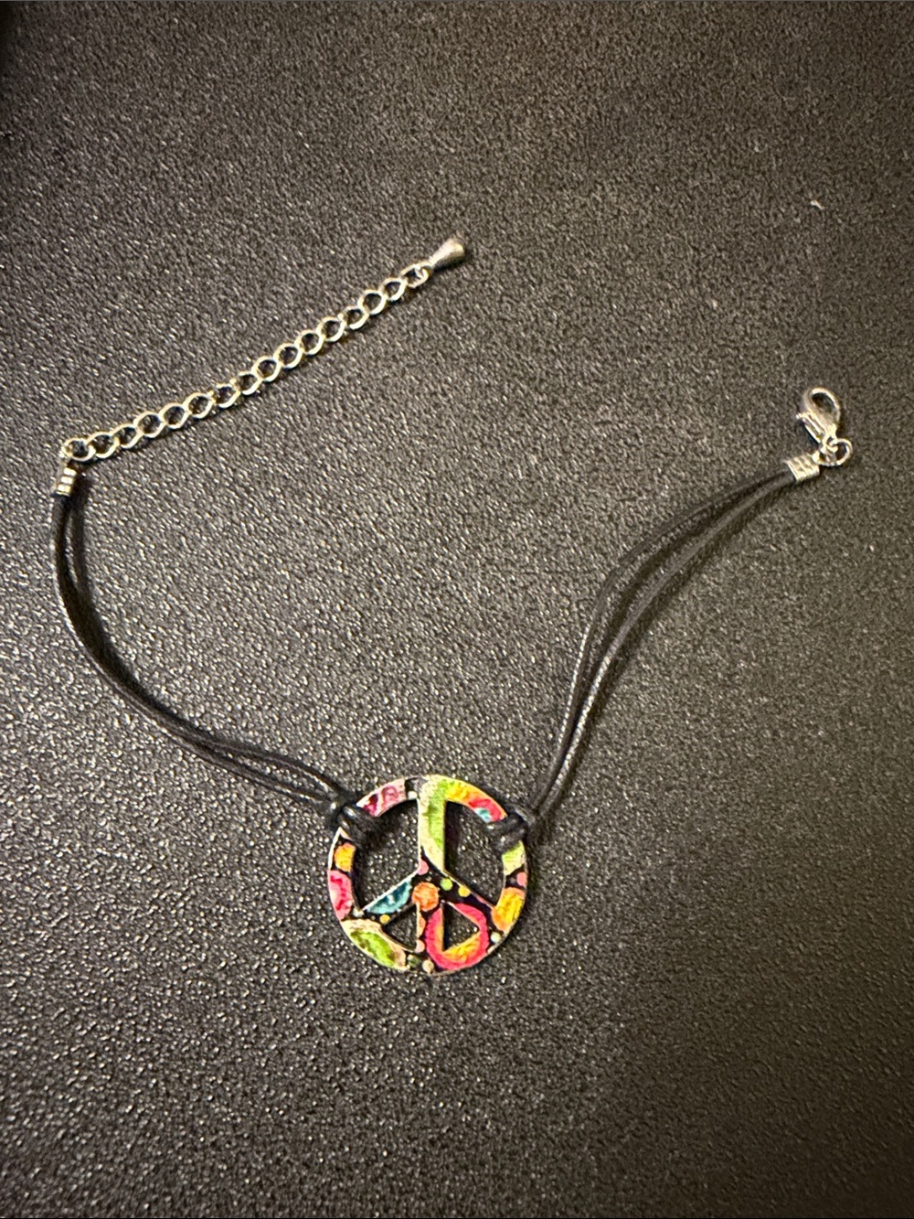 Multicolor Peace Sign Bracelet on Black Cord